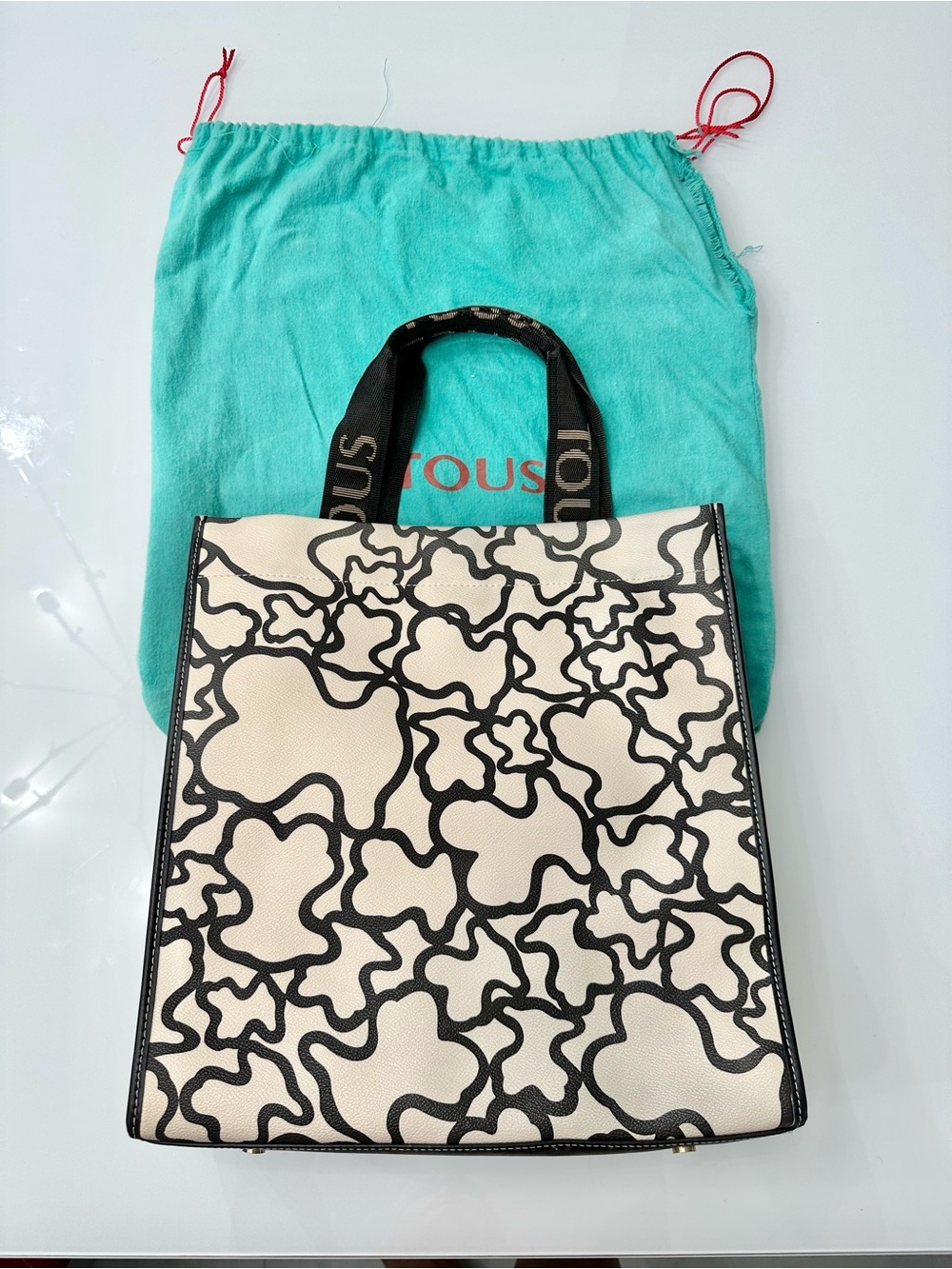 TOUS Leather-Trimmed Tote Bag / Cream Tote with Black Abstract Outline Pattern